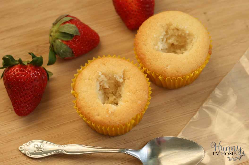 These delicious gluten free strawberries and cream filled cupcakes will be the perfect addition to any Spring or Summer gather, especially a Mother's Day dessert! gluten free cupcakes | gluten free strawberry cupcakes | gluten free filled cupcakes | Spring gluten free cupcakes | Summer gluten free cupcakes | gluten free mothers day dessert #glutenfree