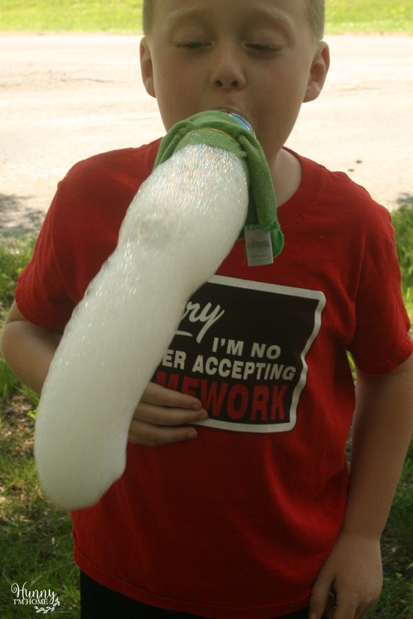 Have fun this summer making your own DIY bubbles. Get ideas at www.hunnyimhomediy.com | big bubbles | large bubbles | huge bubbles | bouncing bubbles | bubble snakes bubble wands | painting with bubbles | bubble recipe | bubble recipes #bubbles