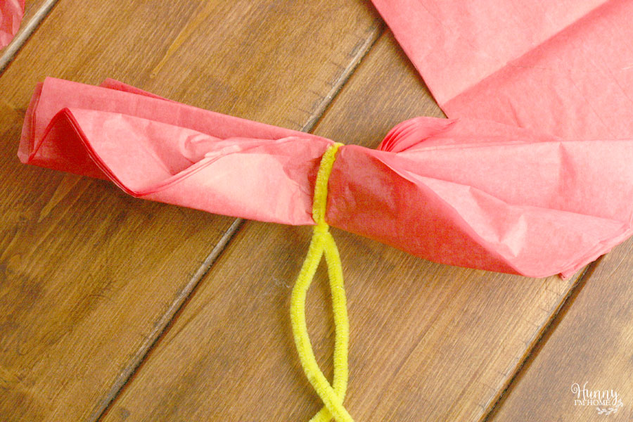 Learn how to make paper flowers for a paper flower centerpiece from hunnyimhomediy.com | paper flowers DIY | paper flower centerpieces DIY | paper flower how to | paper flower centerpiece how to | paper flower crafts | Curious George birthday party decorations | Curious George party decorations