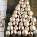 This DIY ornament Christmas tree sign is easy to make and only cost me $4 via Hunny I'm Home DIY | Christmas ornament tree on wood | Christmas ornament tree DIY | Christmas ornaments DIY | Christmas tree sign DIY | Christmas tree sign wooden | Christmas tree signs wood | #DIY #Christmas #Christmassign #ornaments