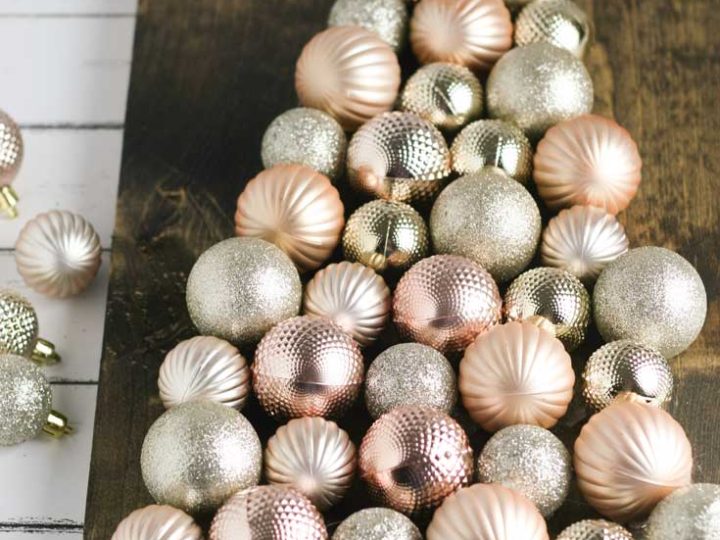 This DIY ornament Christmas tree sign is easy to make and only cost me $4 via Hunny I'm Home DIY | Christmas ornament tree on wood | Christmas ornament tree DIY | Christmas ornaments DIY | Christmas tree sign DIY | Christmas tree sign wooden | Christmas tree signs wood | #DIY #Christmas #Christmassign #ornaments