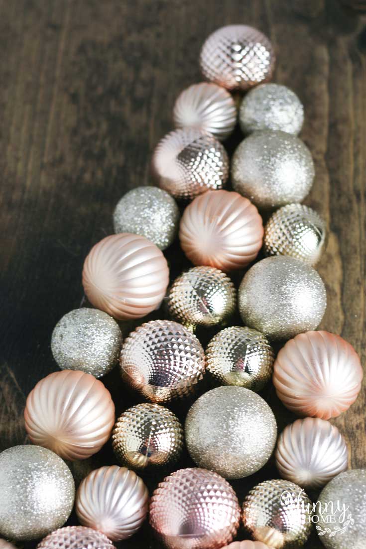 This DIY ornament Christmas tree sign is easy to make and only cost me $4 via Hunny I'm Home DIY | Christmas ornament tree on wood | Christmas ornament tree DIY | Christmas ornaments DIY | Christmas tree sign DIY | Christmas tree sign wooden | Christmas tree signs wood | #DIY #Christmas #Christmassign #ornaments