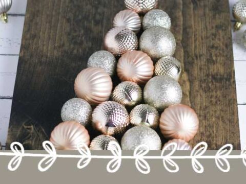 This DIY ornament Christmas tree sign is easy to make and only cost me $4 via Hunny I'm Home DIY | Christmas ornament tree on wood | Christmas ornament tree DIY | Christmas ornaments DIY | Christmas tree sign DIY | Christmas tree sign wooden | Christmas tree signs wood | #DIY #Christmas #Christmassign #ornaments