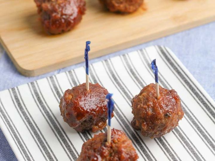 These delicious gluten free meatballs with grape jelly sauce are a delicious way to make grape jelly meatballs. The gluten free meatballs crockpot are easy to make, too! This simple gluten free meatballs recipe is the perfect alternative to traditional crock pot meatballs. Instead, they're yummy gluten free crock pot meatballs. #meatballs #glutenfree #crockpot #slowcooker
