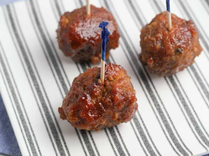 These delicious gluten free meatballs with grape jelly sauce are a delicious way to make grape jelly meatballs. The gluten free meatballs crockpot are easy to make, too! This simple gluten free meatballs recipe is the perfect alternative to traditional crock pot meatballs. Instead, they're yummy gluten free crock pot meatballs. #meatballs #glutenfree #crockpot #slowcooker