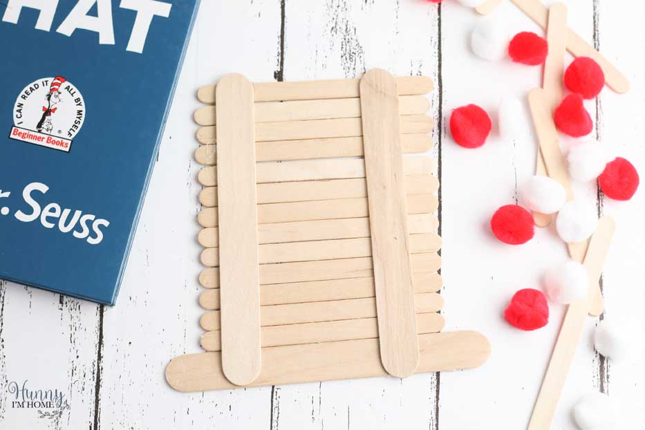 This cute Cat in the Hat craft is a great Dr. Seuss activity for Dr. Seuss's birthday. If you're searching for fun Cat in the Hat activities, you'll love this adorable Dr Seuss crafts. #craftsforkids #DrSeuss #CatintheHat