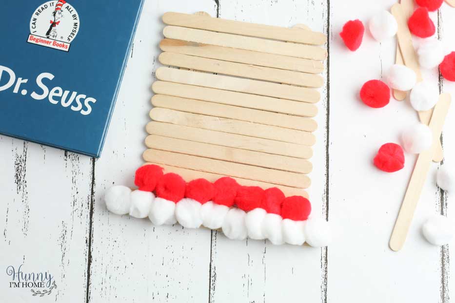 This cute Cat in the Hat craft is a great Dr. Seuss activity for Dr. Seuss's birthday. If you're searching for fun Cat in the Hat activities, you'll love this adorable Dr Seuss crafts. #craftsforkids #DrSeuss #CatintheHat