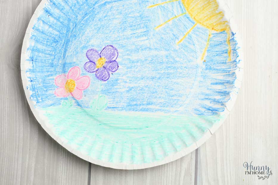 Your kids will love this adorable hopping bunny craft for kids! It's the perfect bunny craft for preschoolers or bunny craft kindergarten. This fun paper plate craft is great as an Easter craft for kids or a spring craft for kids. It's also a super fun cotton ball bunny craft! #craftsforkids #DIY #Easter