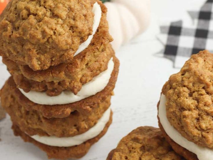 Finished gluten free pumpkin oatmeal creme pies stacked on top of each other