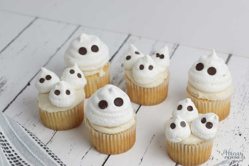 Ghost meringue cupcakes with a meringue cookie topper
