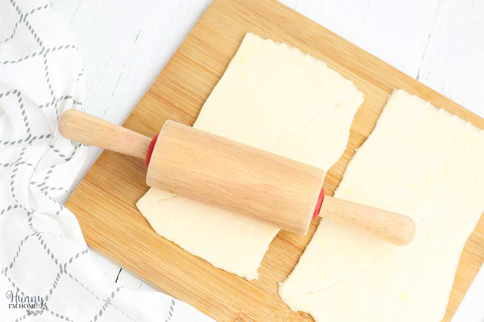 Roll the dough for the Halloween finger foods
