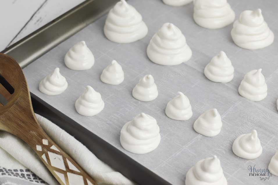 Pipe the meringue ghosts