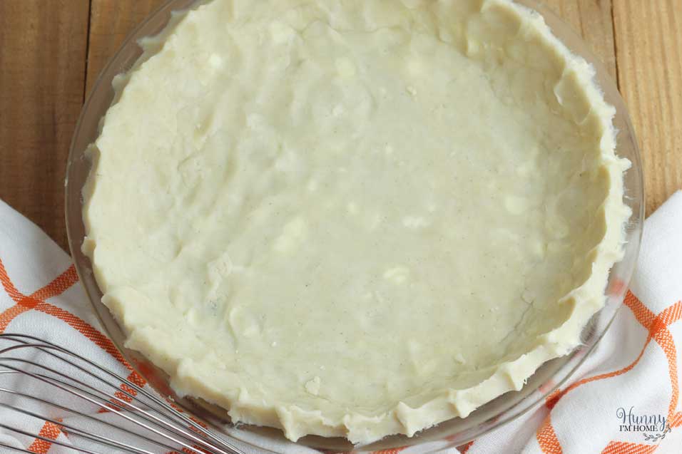 Put gluten free pie crust in pan