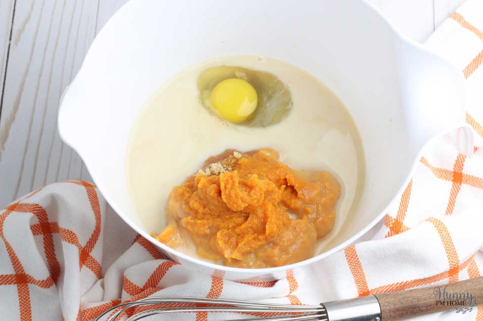 Mix pumpkin in gluten free pumpkin muffins