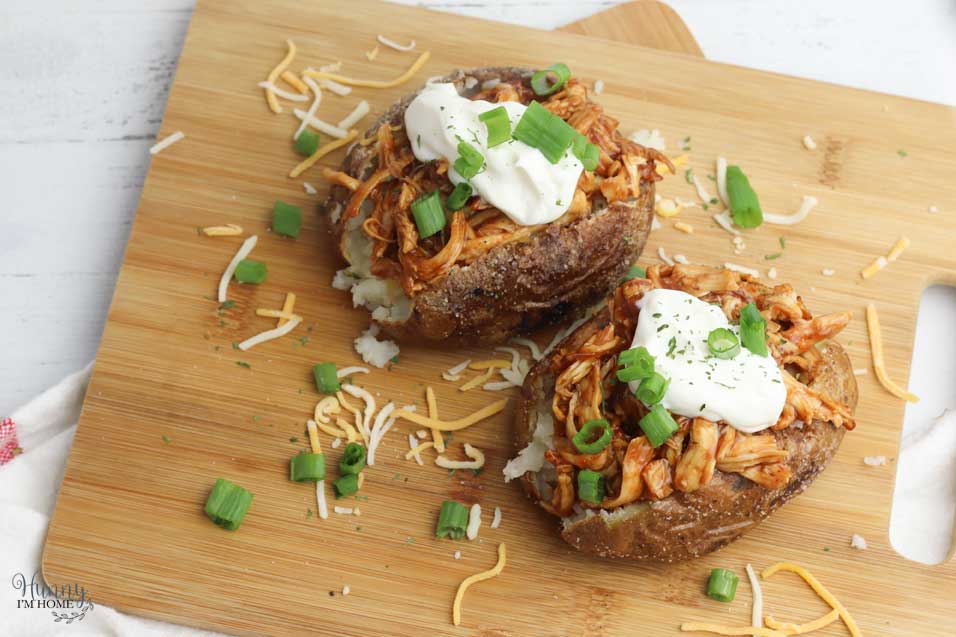 Garnish with sour cream and onions