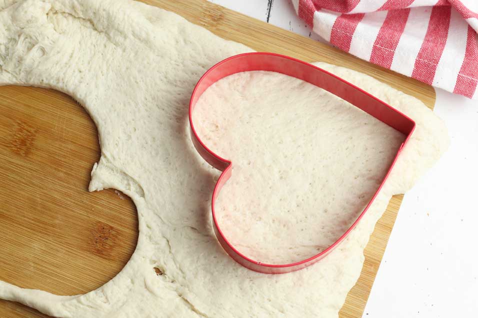Use a cookie cutter to cut heart pizza