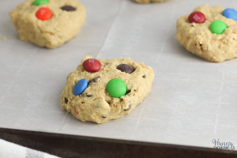 Top the gluten free oatmeal cookies with M&Ms