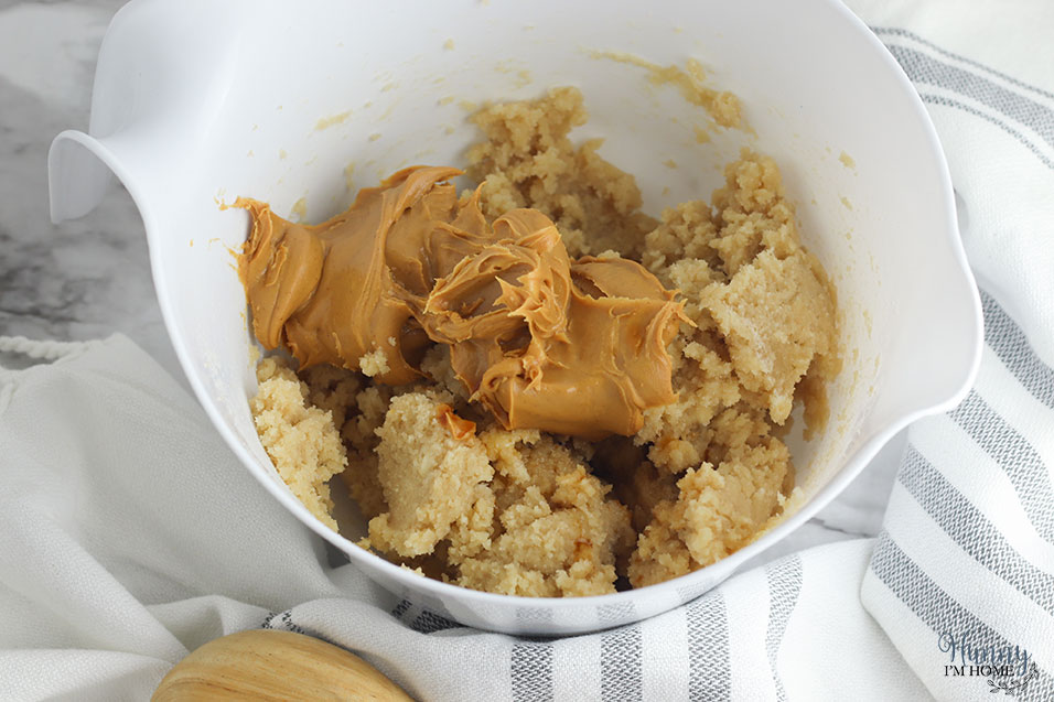Add the peanut butter to the gluten free oatmeal cookies