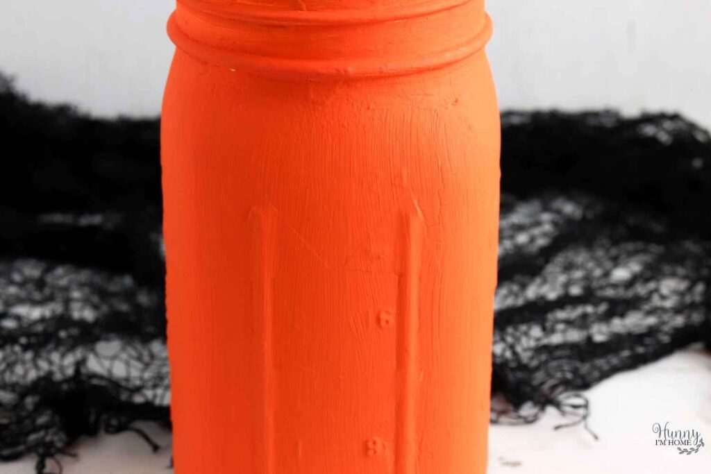 jack o lantern jar with orange paint