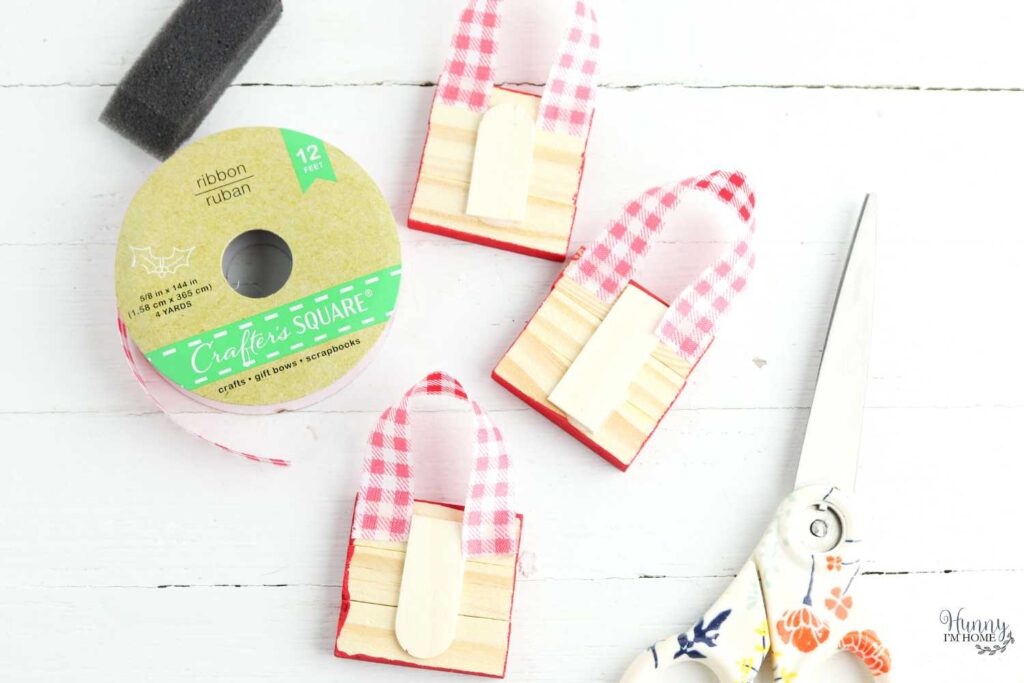 wood ornaments with gingham ribbon