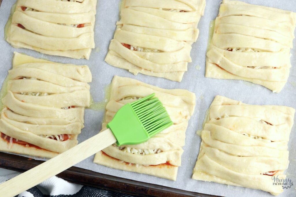 crescent roll mummy pizzas